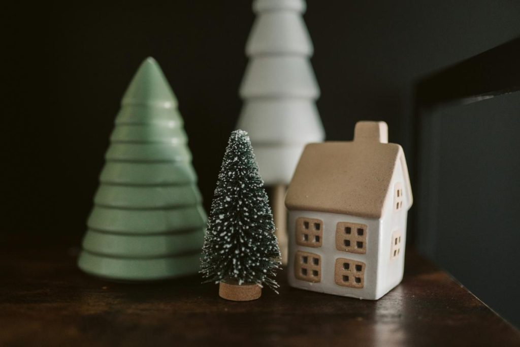 mini house and christmas tree figurines