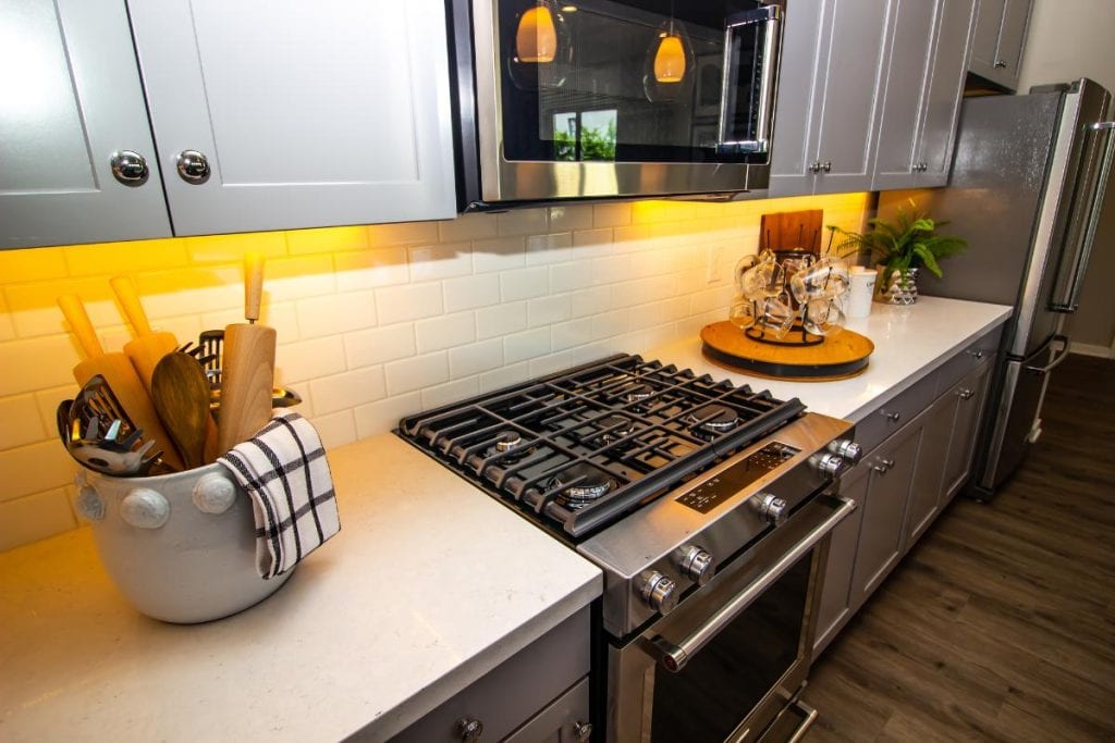 a small modern kitchen with tidy countertops