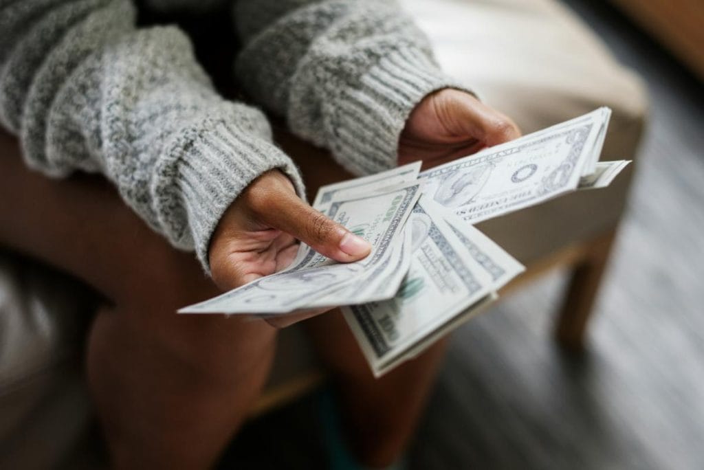 woman counting cash