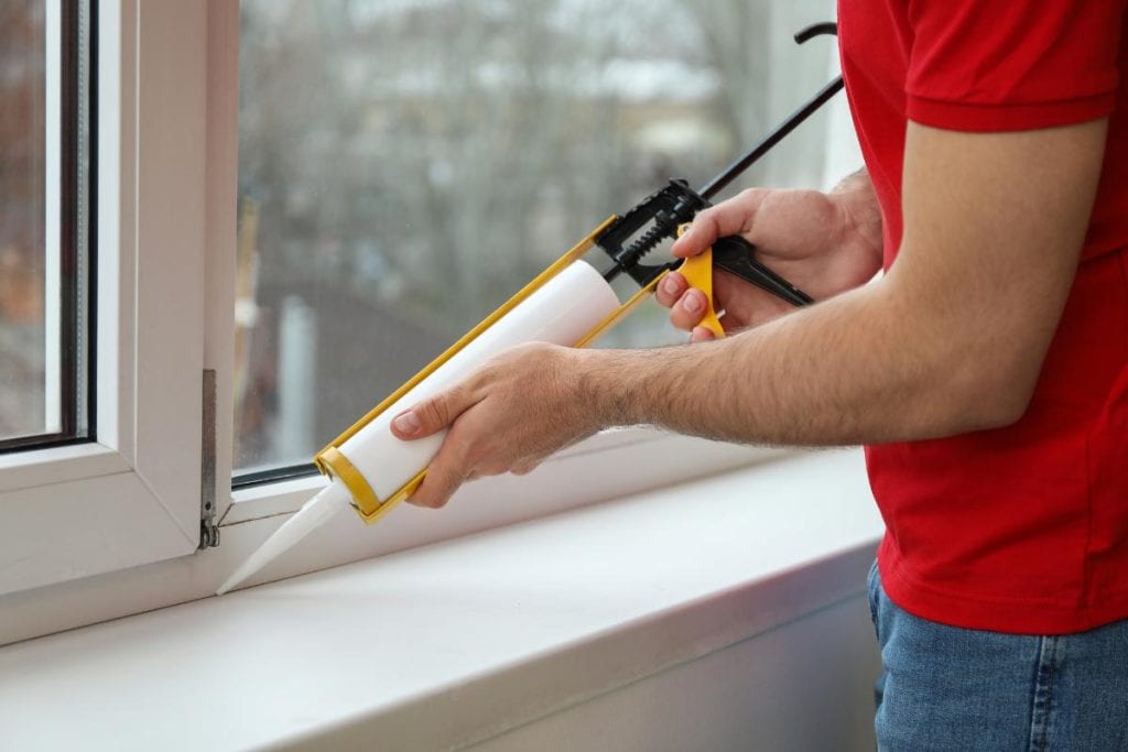 sealing windows with caulk