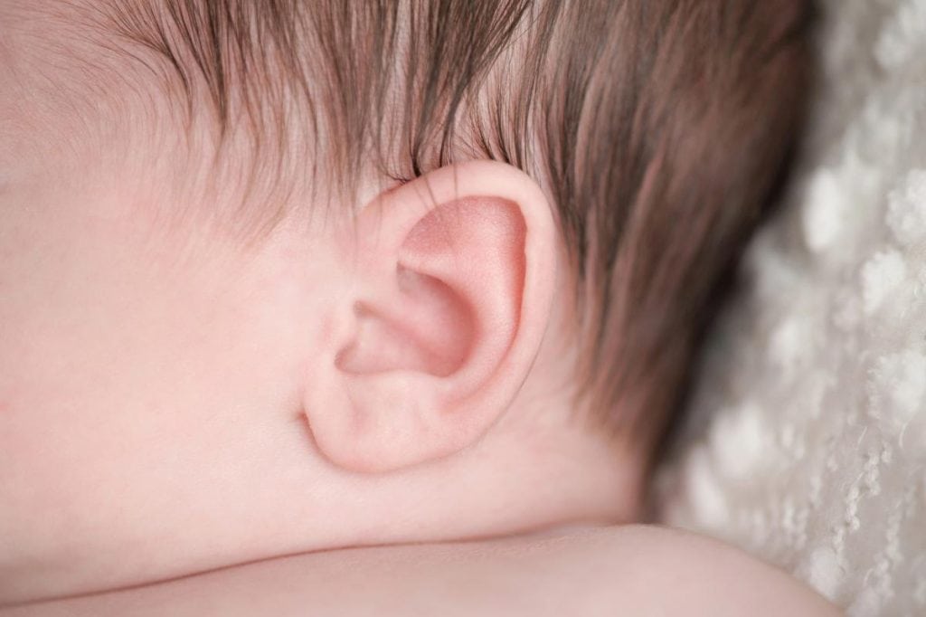 baby's left ear close up