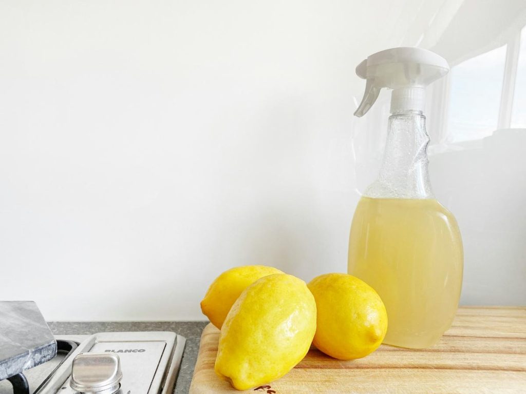 lemons and a bottle of cleaner