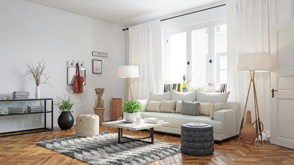 living room with rug and white couch