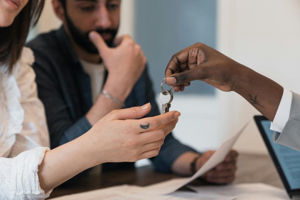 couple receiving house keys