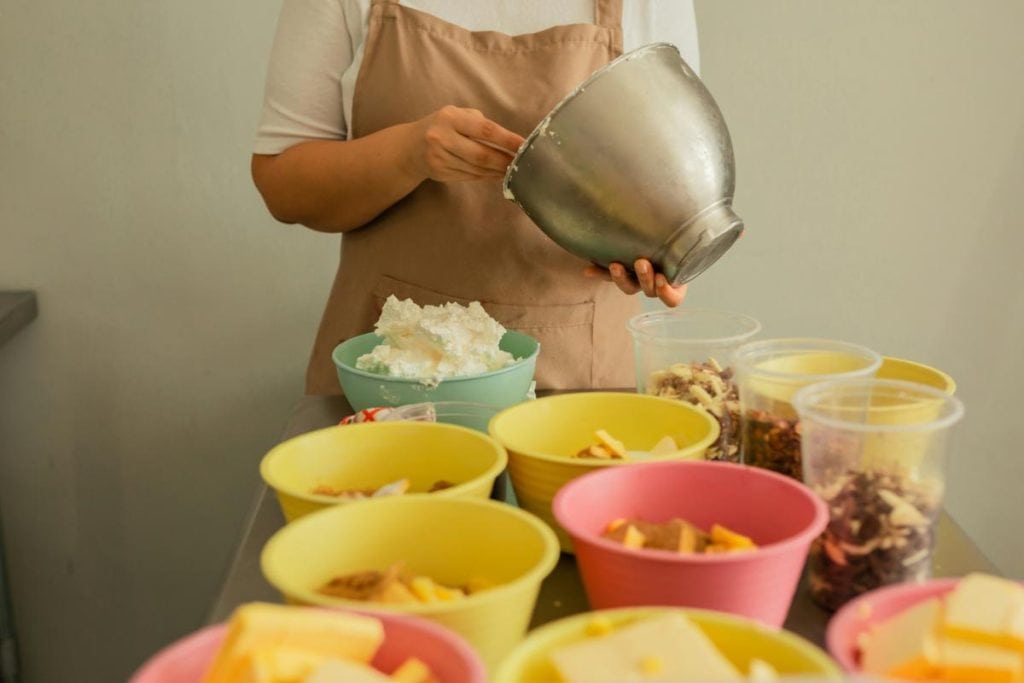 caterer making multiple dishes