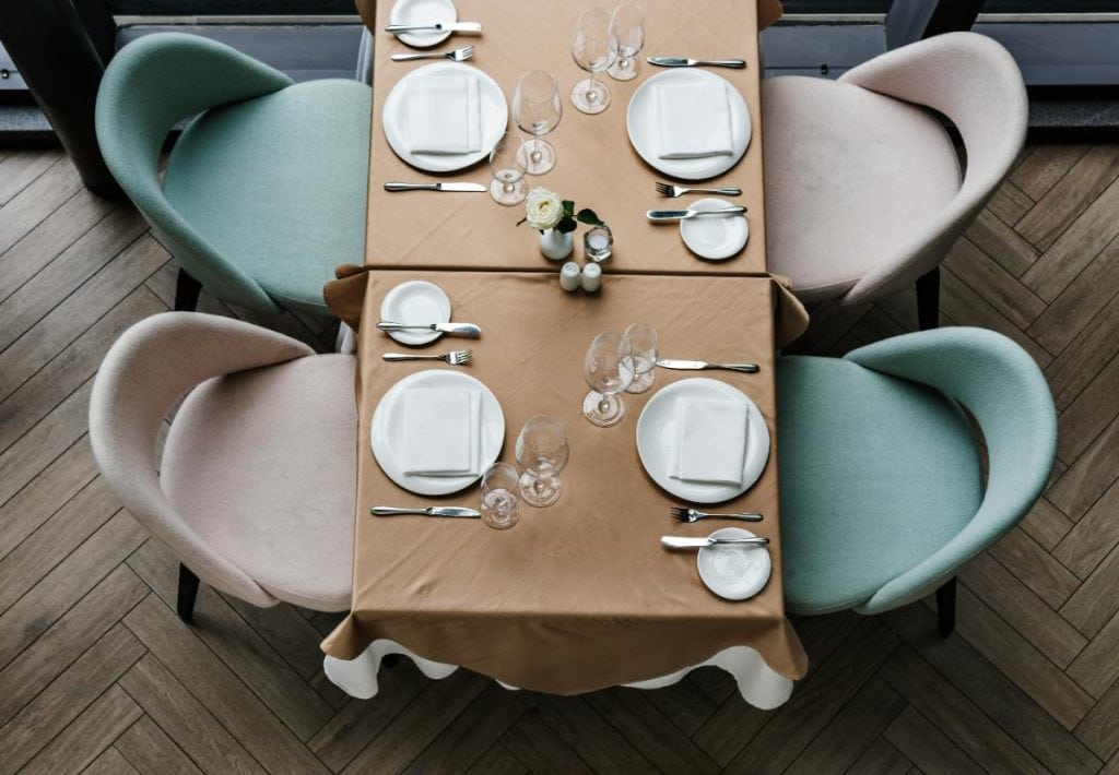 colorful dining chairs in small space