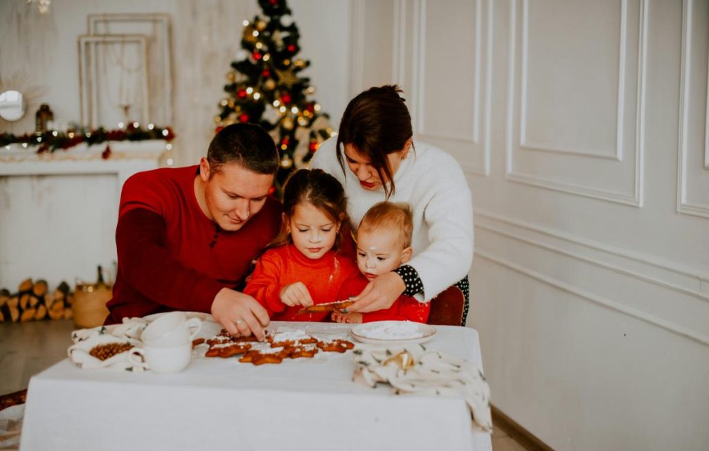 family making Christmas cookies together