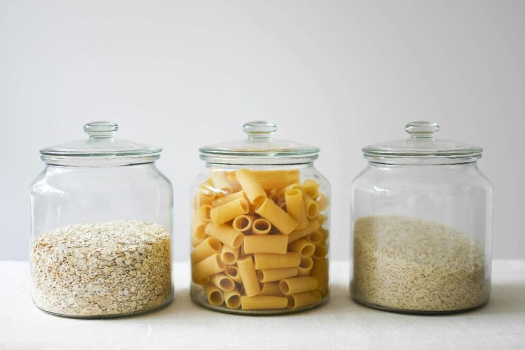 pasta, rice, and oats in glass jars