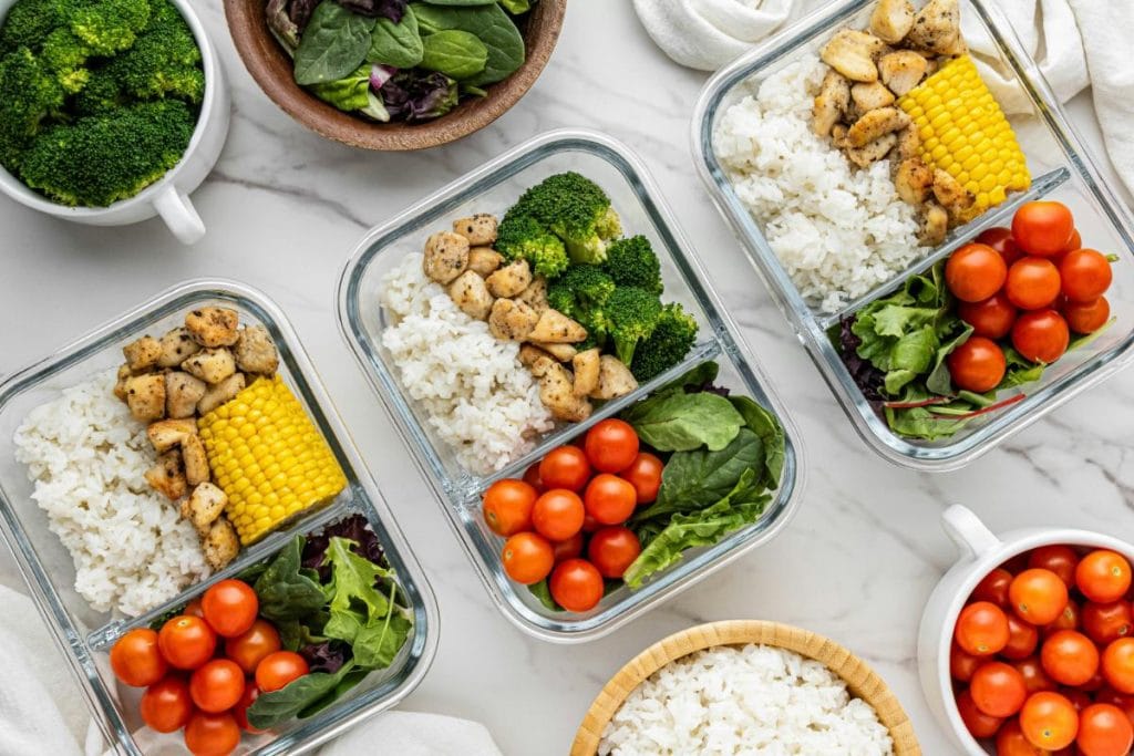 chicken, veggies, and rice in meal prep containers