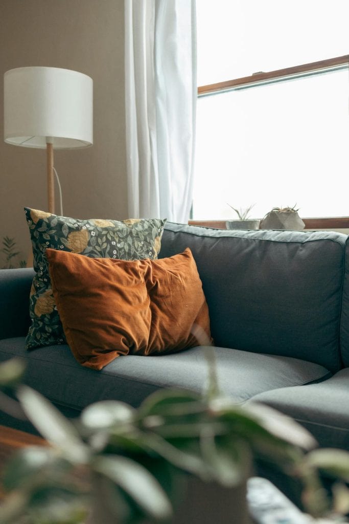 couch with colorful throw pillows