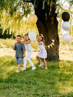 kids with balloons at a party