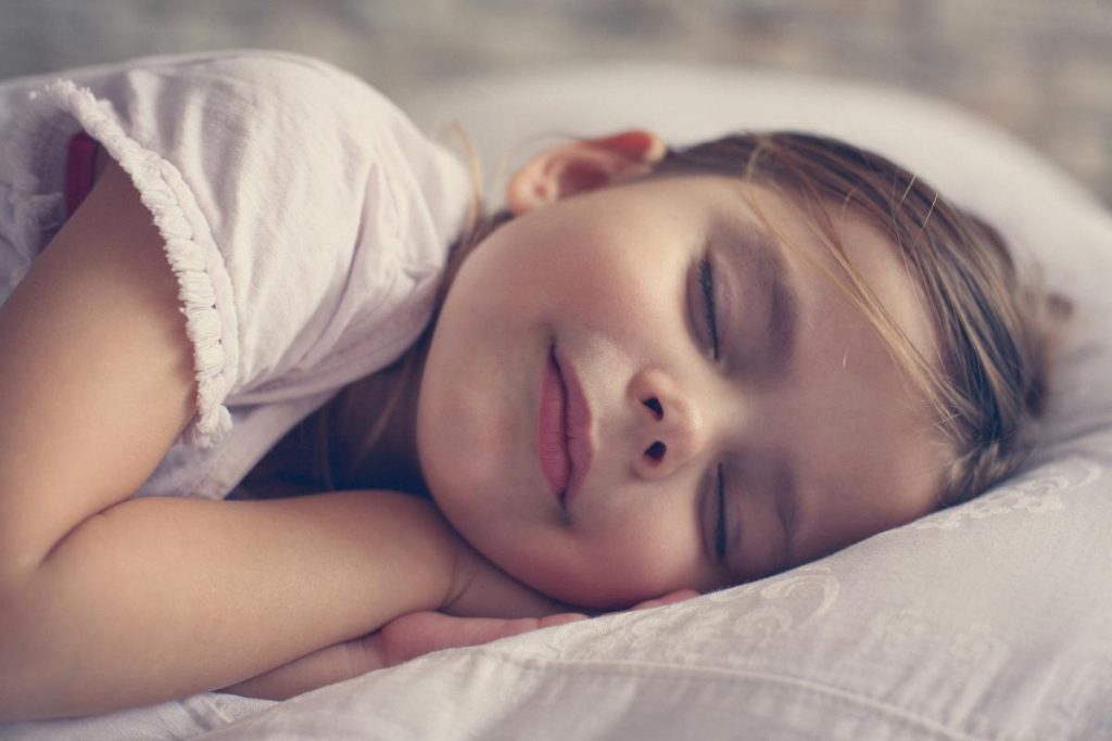 smiling girl sleeping