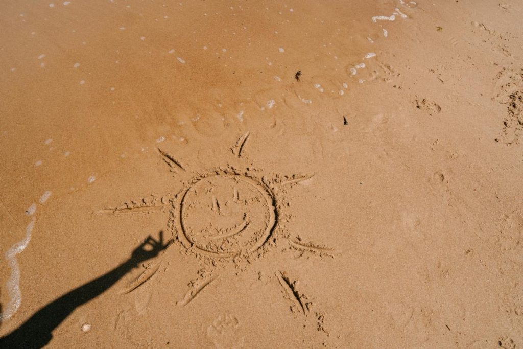 sunshine drawn in the sand