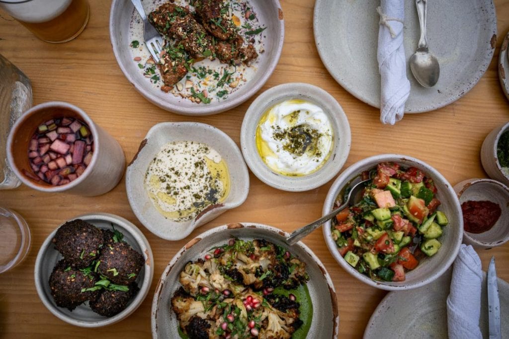 various mediterranean dishes on a table