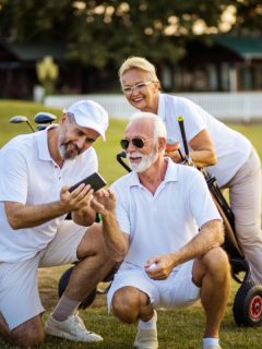 group of three seniors at the golf course