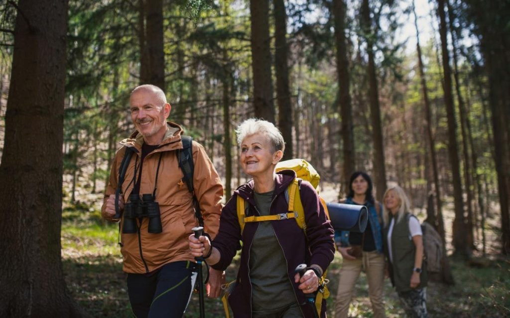 seniors on a hike in the woods