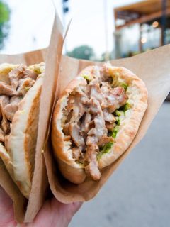 person holding stuffed pitas