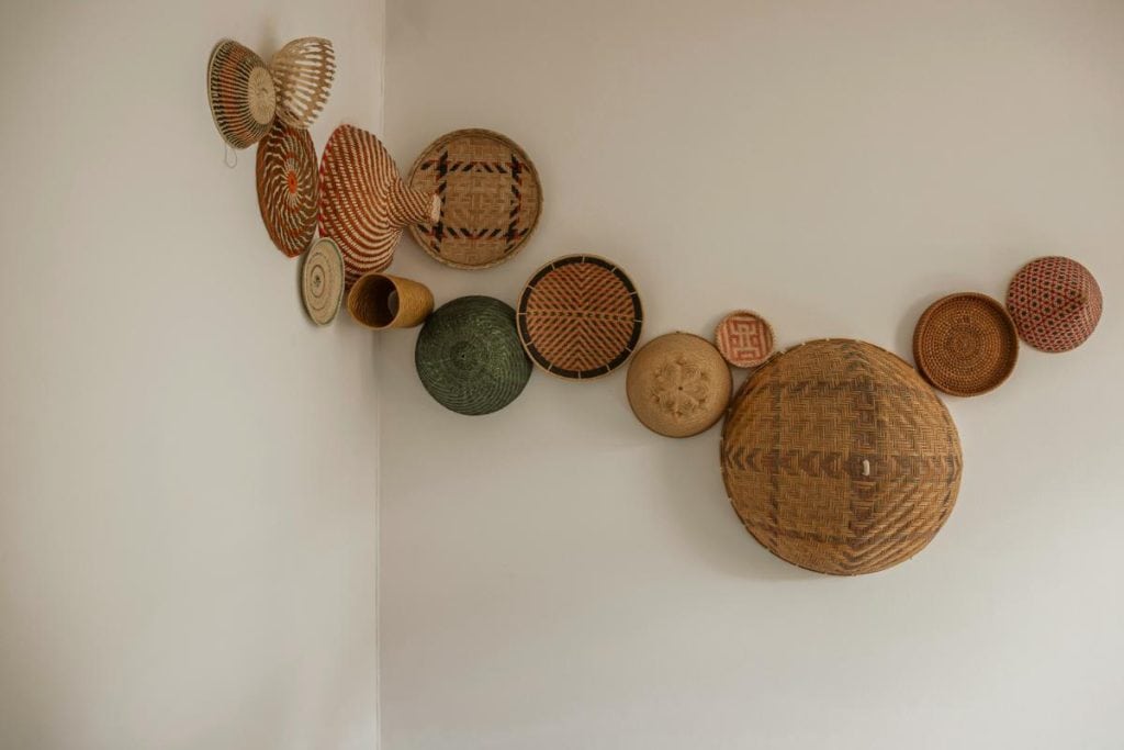 baskets to create dimension on wall