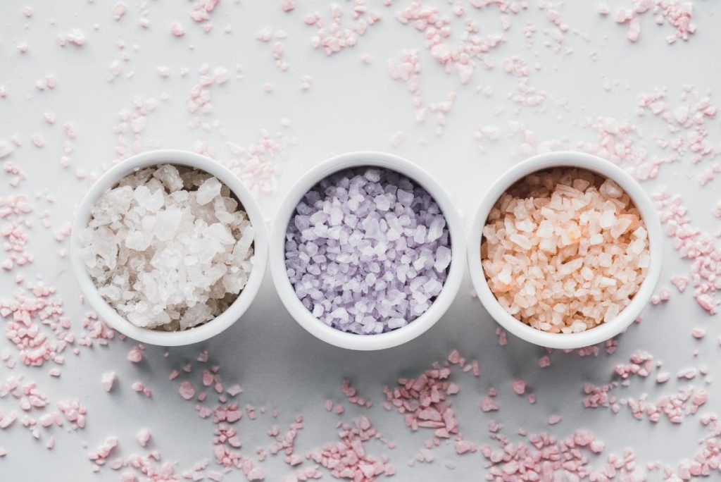 colorful sea salts in white ramekins 