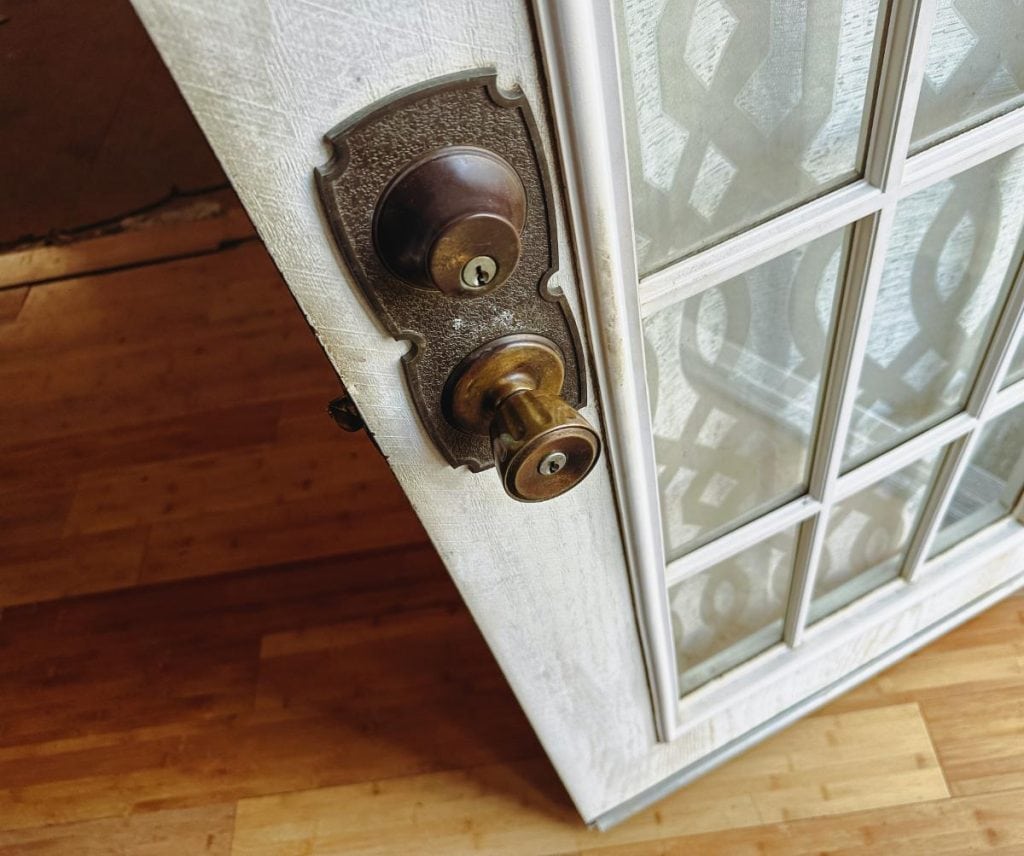 open door showing lock and door knob