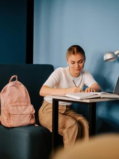 female college student studying at a quiet table