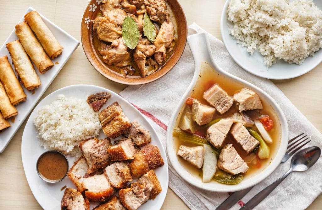 Filipino dinner items including chicken adobo