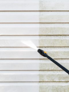 cleaning siding using a power washer - a great tool to have for home maintenance