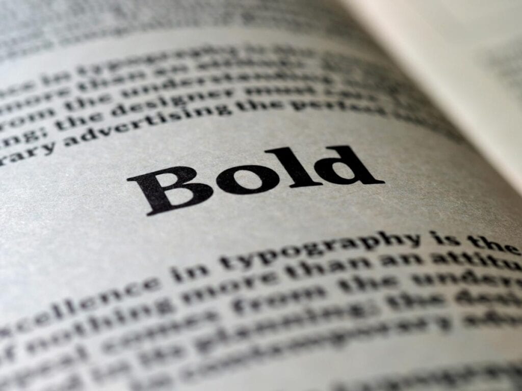 the world "bold" in serif font on a page of a book with other text