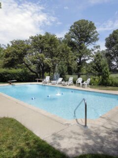 a brick house with a swimming pool