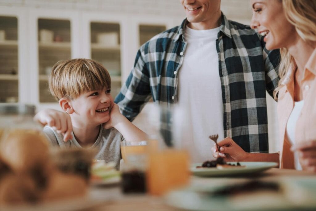 parents having a meal with their son