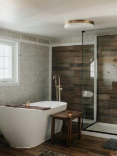 a relaxing spa-like bathroom with a deep tub and separate walk-in shower