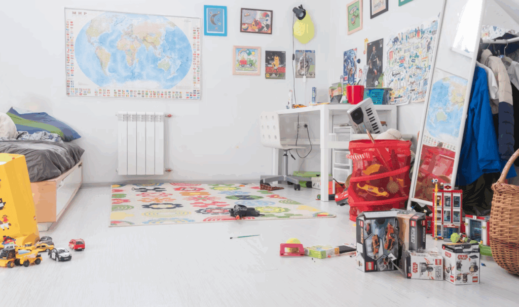 large child's bedroom with various toys in bins and boxes