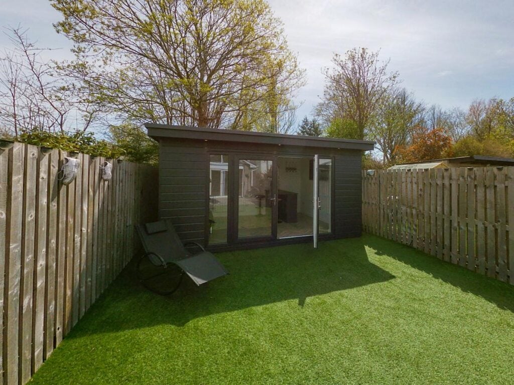 a small outdoor building that would be perfect for a garden office