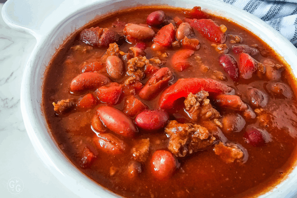 a close-up shot of the venison chili showing the beans, meat, and tomatoes