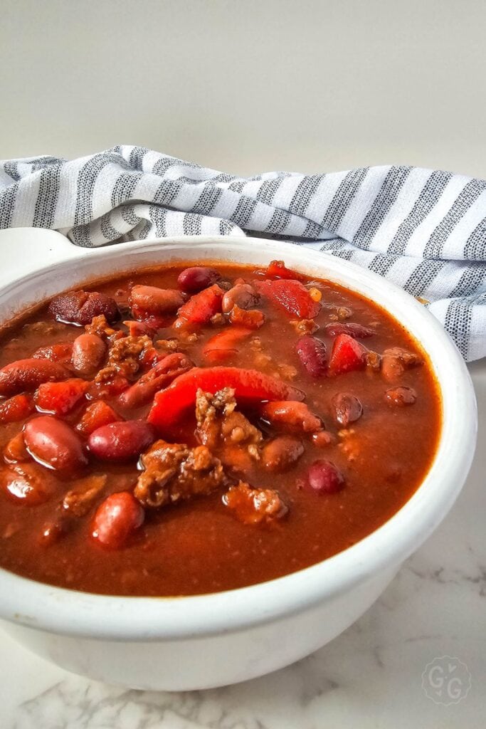 close up picture of the venison chili in a white dish