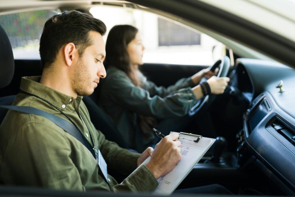 young woman taking a driving course