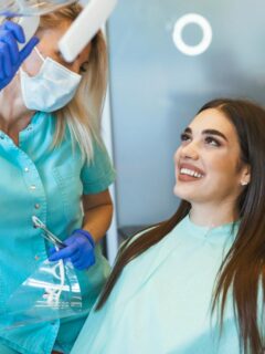 smiling young woman at dentist appointment