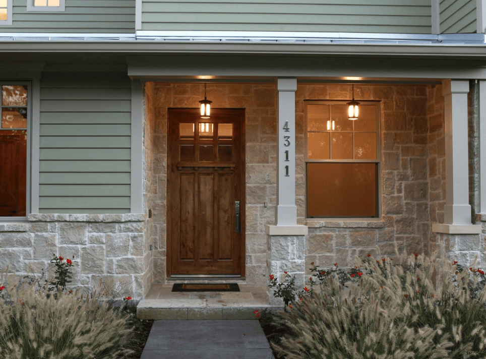 large house numbers on white porch post