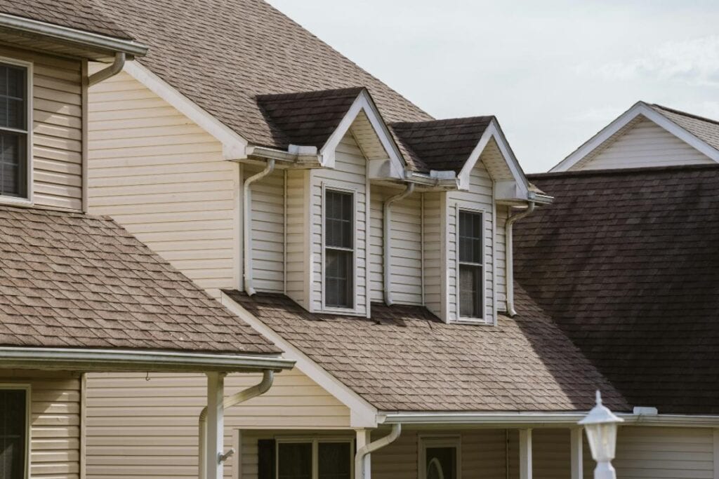 a large house with gables and gutters