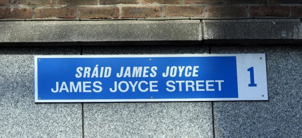 James Joyce Street sign in Dublin, highlighting the city's literary heritage and connection to the author celebrated during Bloomsday.