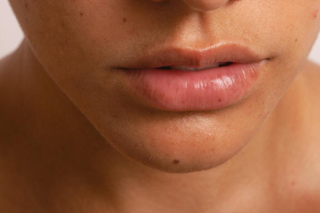 woman with bare moisturized lips