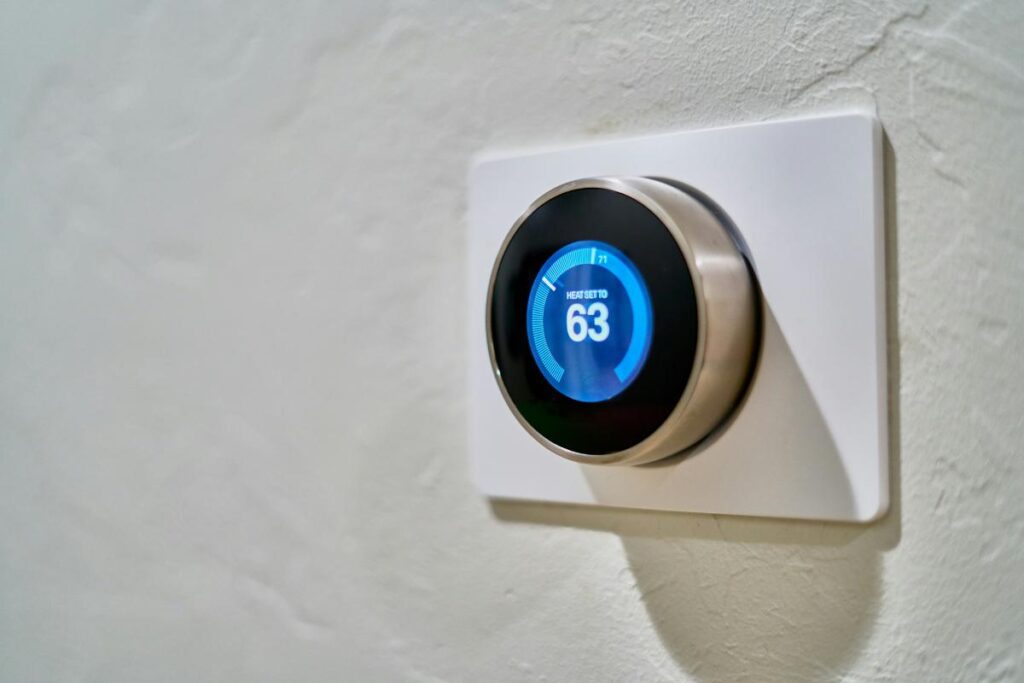 a digital thermostat set to 63