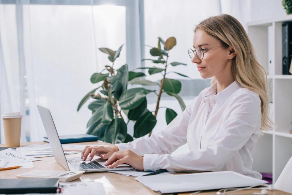 Administrator using secure NDIS plan management software.