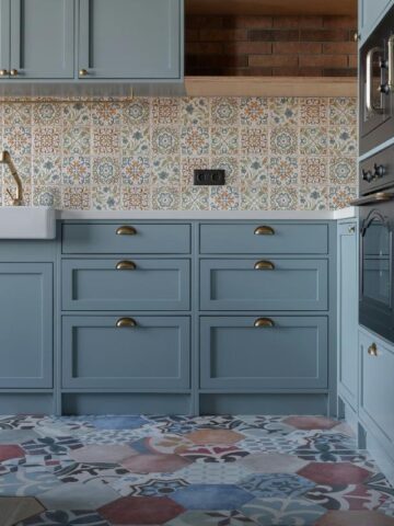 blue cabinets brass handles