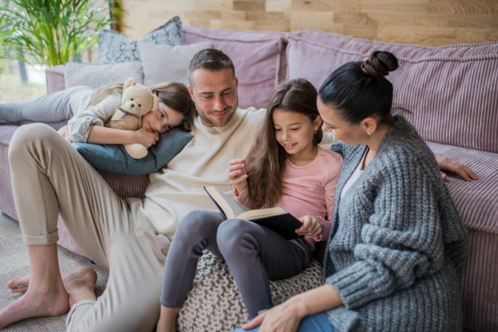 family reading together in living room