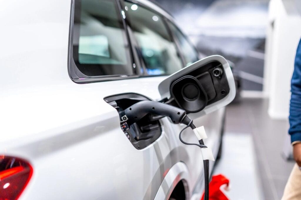 Electric vehicle connected to a home charging station.