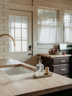 kitchen with a large island and new faucet