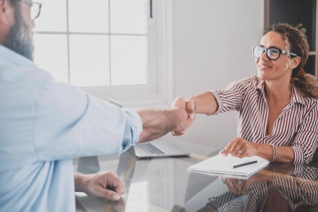 Business owner meeting with an SEO agency consultant.