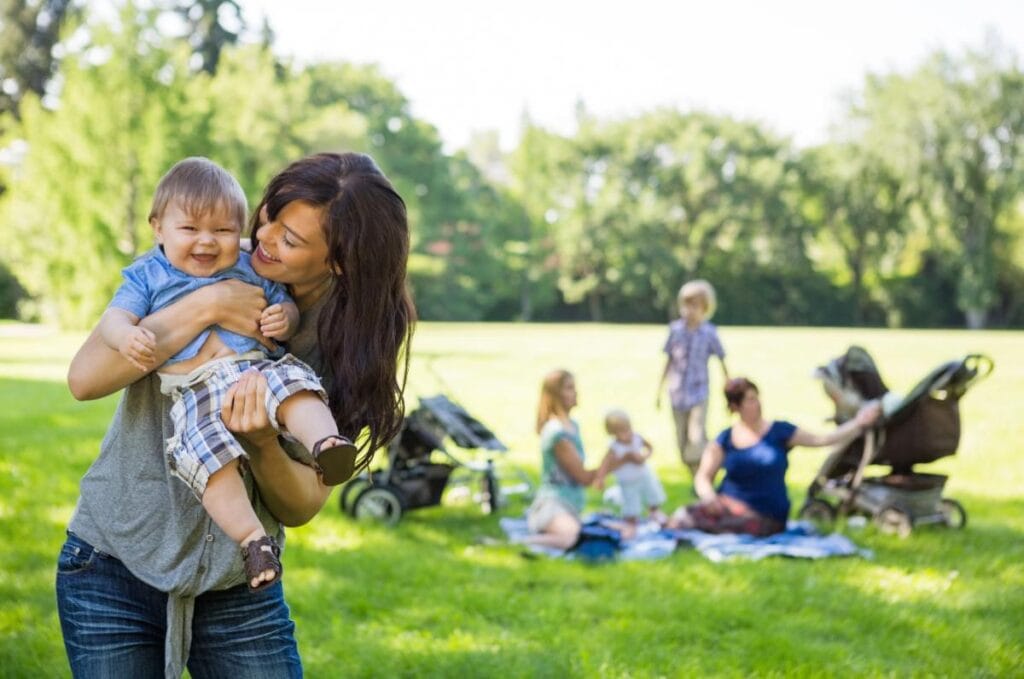 mom and kids on playdate at the park