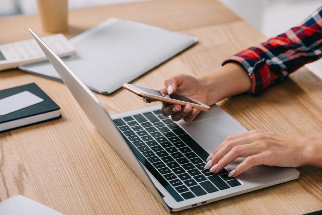 User accessing secure financial management software with multi-factor authentication.